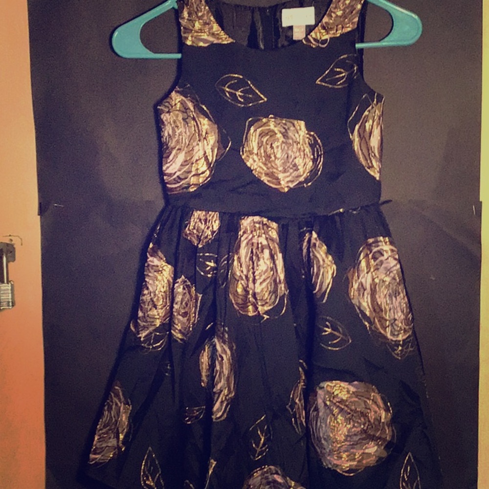Black And gold dress.
